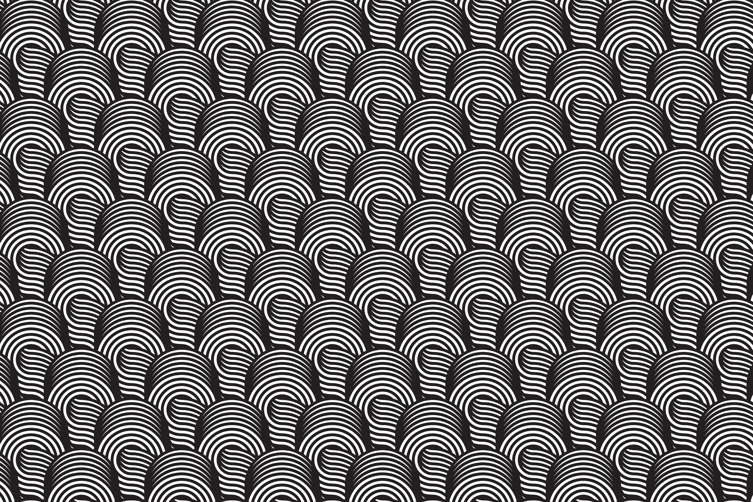 A black and white pattern of overlapping semicircular shapes with nested curved lines, resembling a fingerprint-like design. The shapes are densely arranged, creating a visually intricate and repetitive geometrical texture, perfect for a sophisticated web design by Millworks Web Design & Graphics.