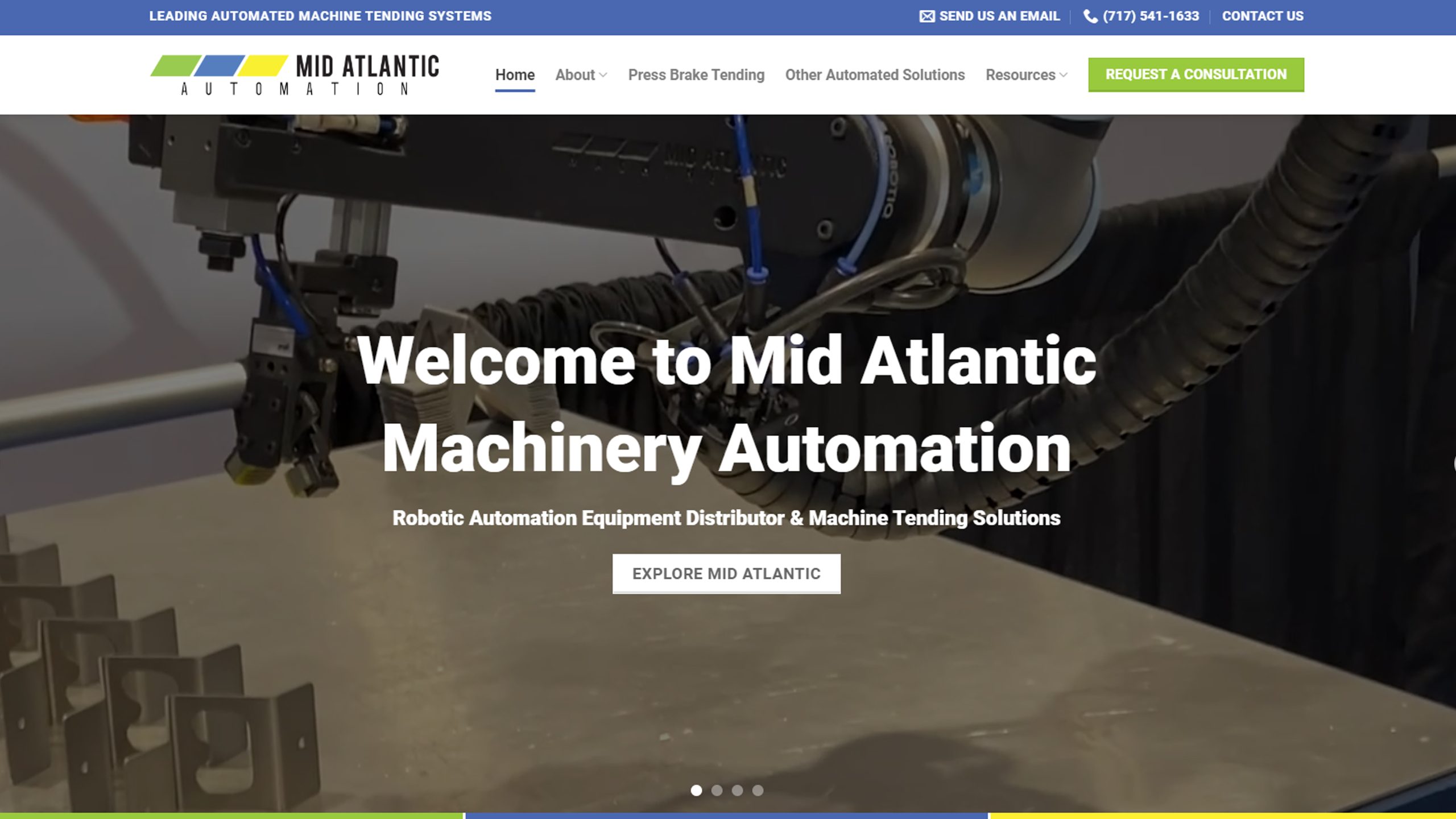 A website homepage for Mid Atlantic Machinery Automation, designed by Millworks Web Design & Graphics. The header features a robotic arm, a navigation menu, and the text "Welcome to Mid Atlantic Machinery Automation." Below, there is a button labeled "Explore Mid Atlantic" for further exploration.