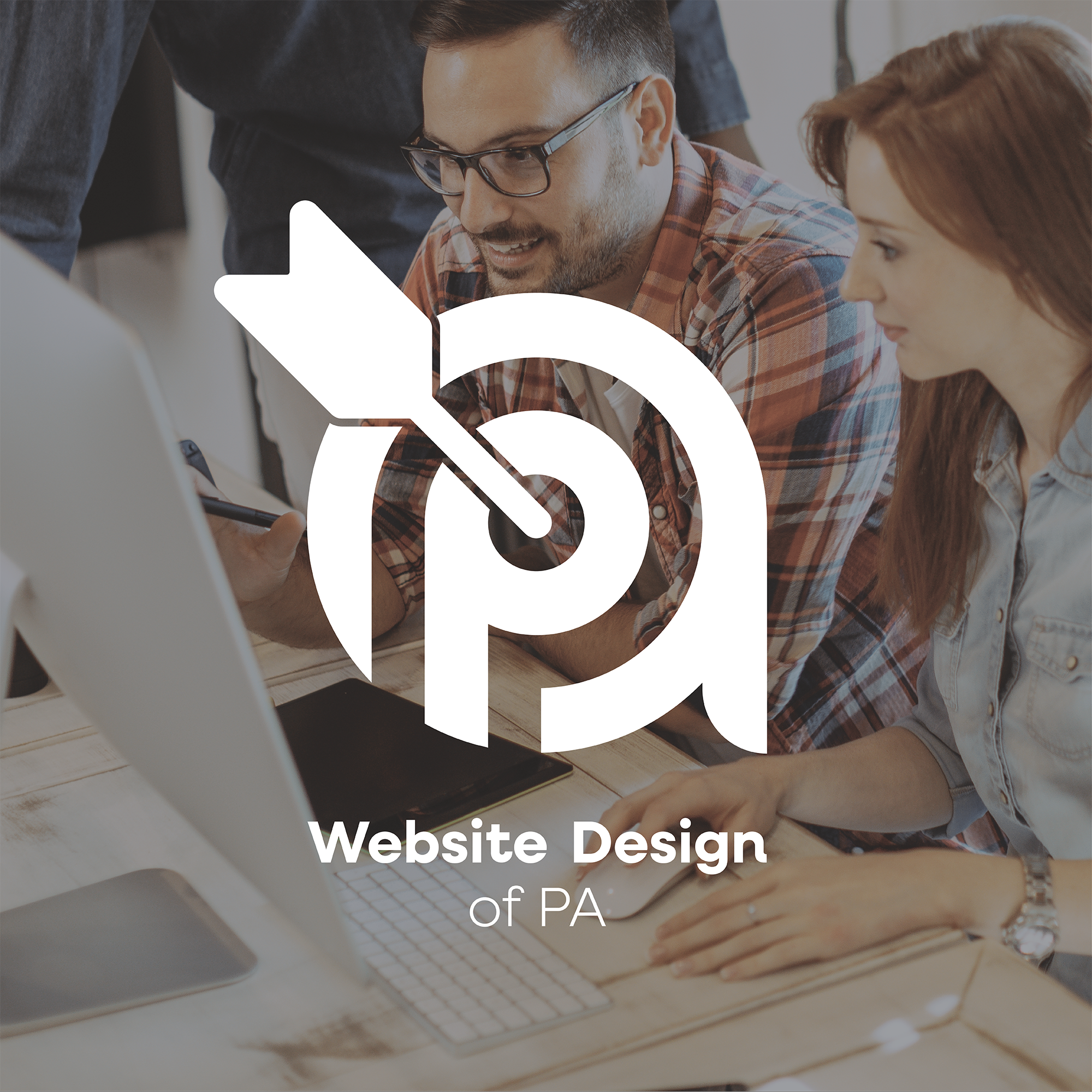 Two people look at a computer screen while discussing their graphics portfolio. The image features a white overlay with a stylized letter "P" and an arrow forming the logo for "Website Design of PA." The individuals are focused and engaged in their work.