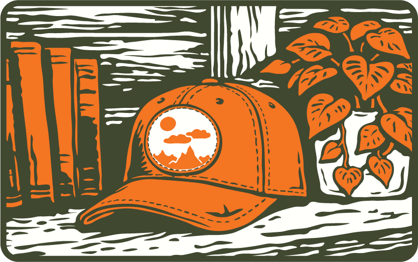An illustration of an orange baseball cap with a mountain and sun patch, resting on a shelf beside three books and a potted plant with heart-shaped leaves—perfect inspiration to elevate your small business space.